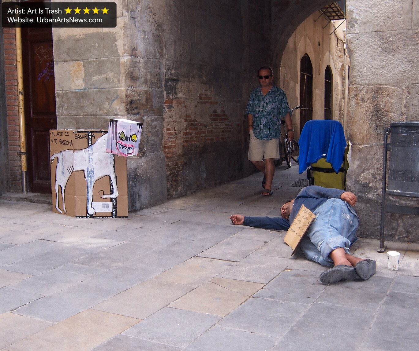 Art Is Trash Barcelona urban art: Ephemeral cardboard street art by Art Is Trash in Barcelona's Gothic Quarter.