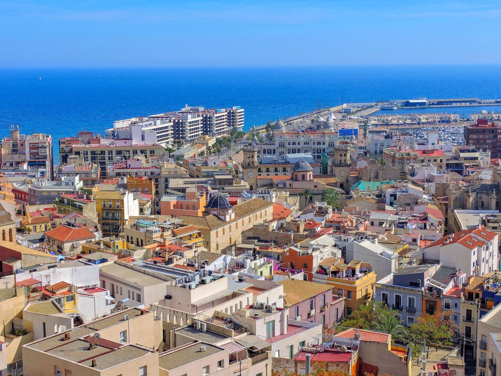 Badalona city blocks, marina and Mediterranean from above