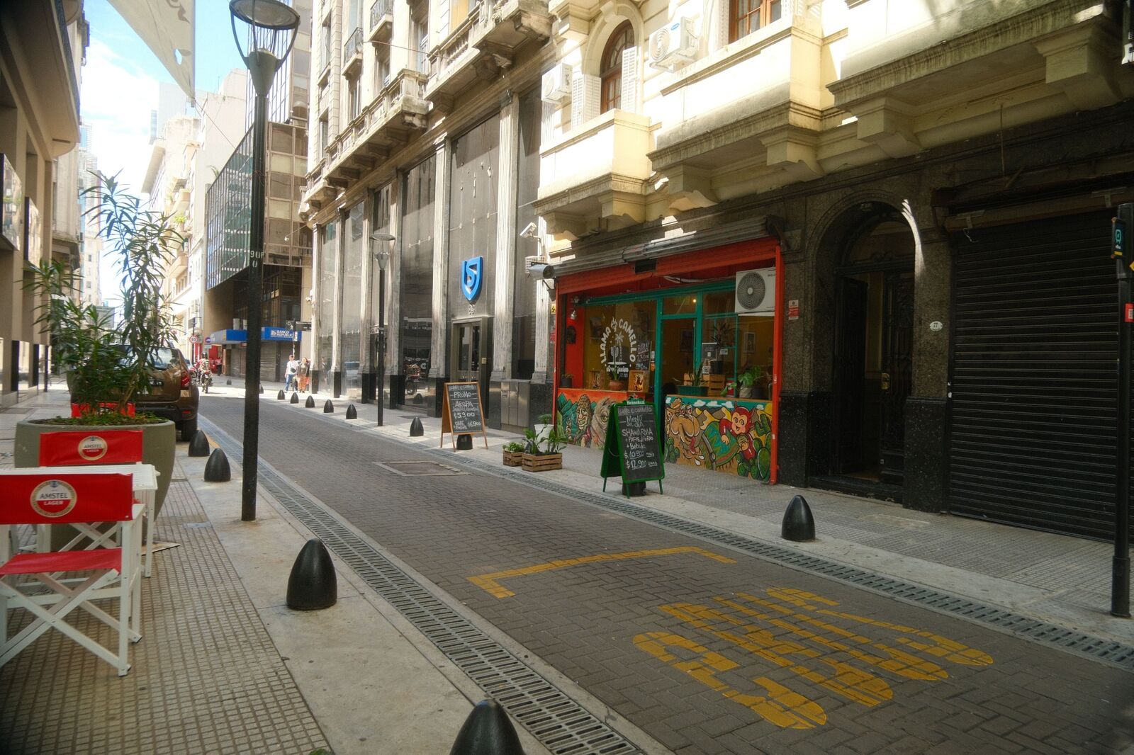 Colourful storefront on a narrow Buenos Aires city street