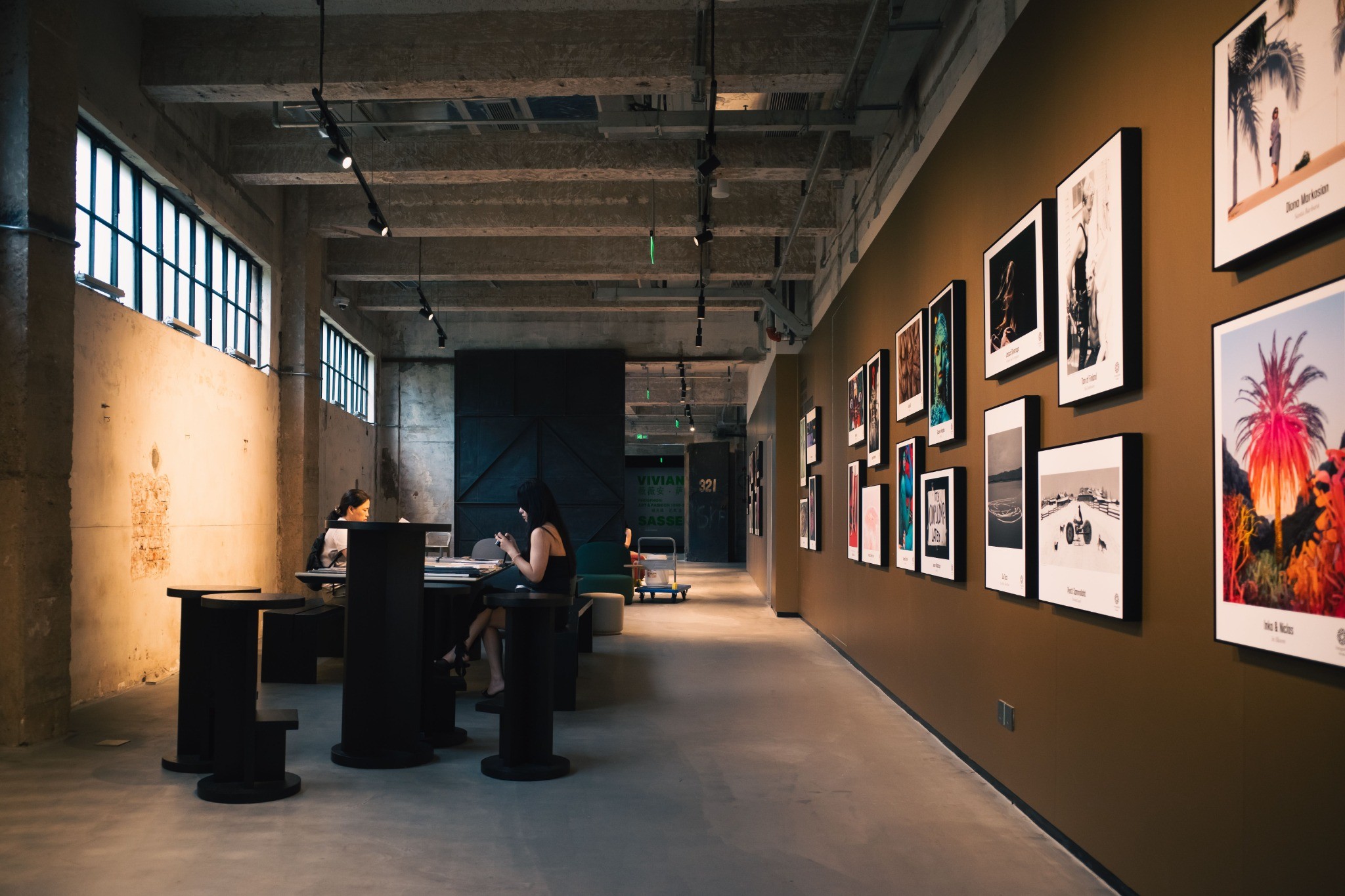 Urban art gallery exhibition inside a converted industrial building